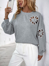 Load image into Gallery viewer, Perfee Cutout Pearl Round Neck Long Sleeve Sweatshirt